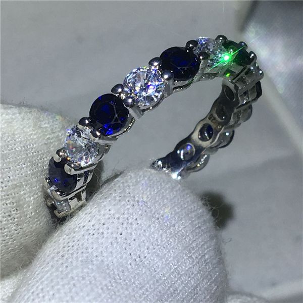 Elegant infinity ring in 925 sterling silver with blue 5A zircon and cubic zirconia, perfect for women's engagement or bridal jewelry