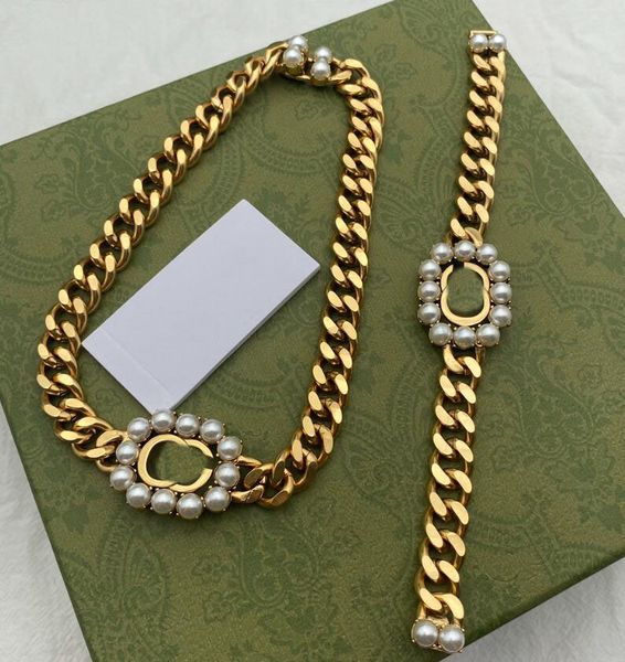 Elegant pearl collar choker with a bold double-letter design, featuring a chunky thick chain for stylish women's jewelry