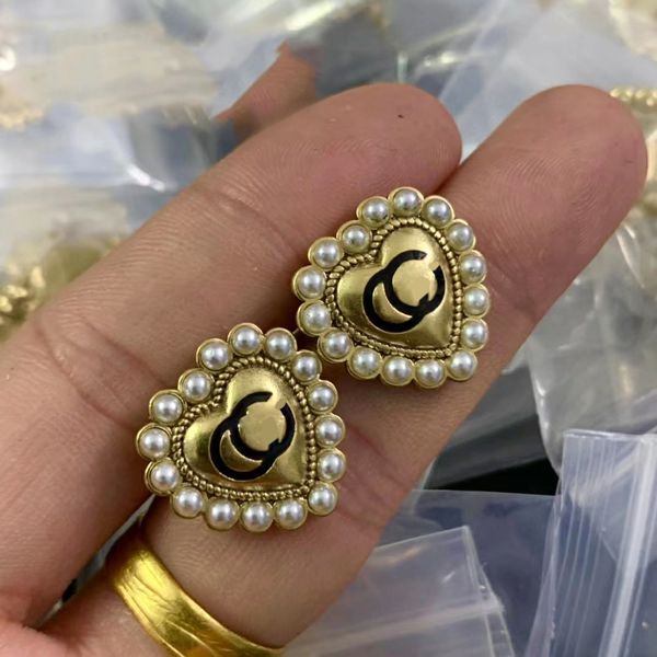Elegant pearl-studded letter heart earrings for women, a stylish jewelry gift