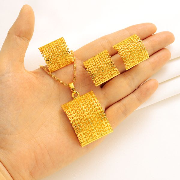 Elegant solid gold bridal jewelry set featuring pendant, earrings, and rings for women, perfect for parties in Dubai, India, and Africa