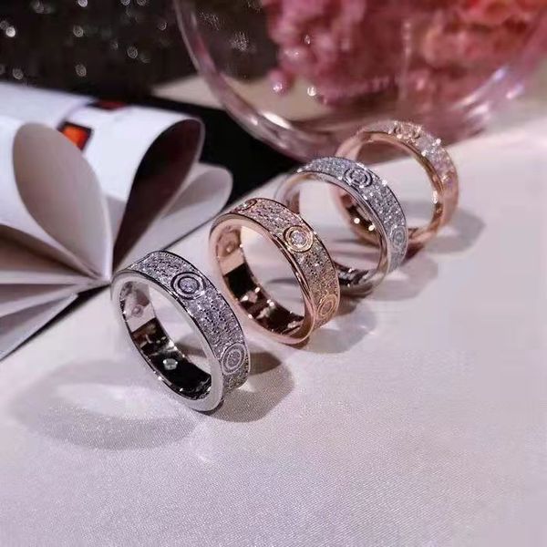 Elegant three-row diamond love ring for women, crafted from premium 316L titanium steel for wedding and fashion jewelry
