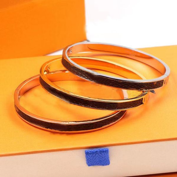 Elegant titanium steel leather bracelet with oval arc design, a stylish and versatile women's fashion jewelry piece featuring a luxury buckle