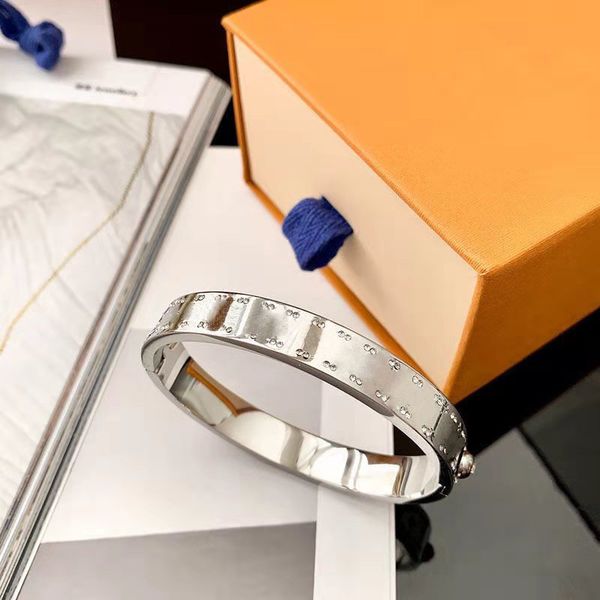 Elegant unisex diamond-letter bangle bracelets for men and women, available in six stylish options