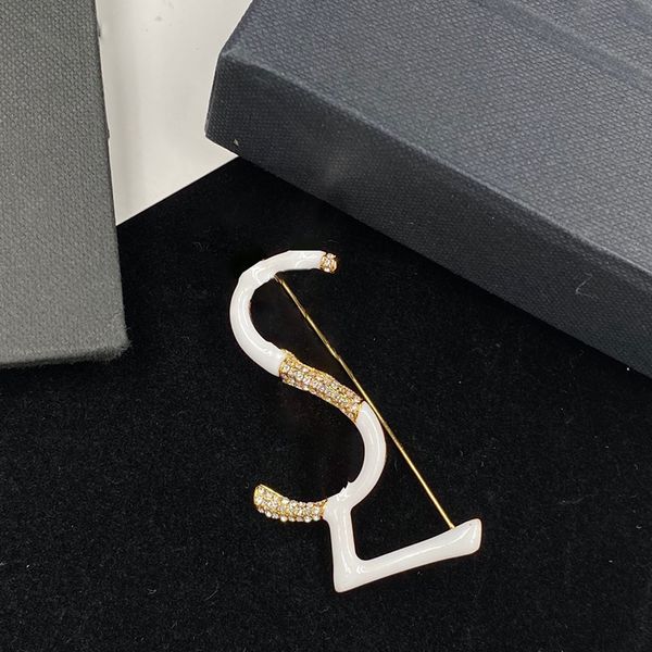 Elegant white jade and gold-plated brooch for stylish women, perfect for parties and comes with a gift box