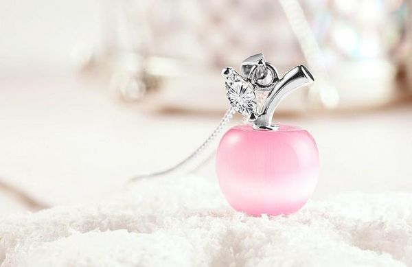 Elegant women's 925 sterling silver necklace featuring a crystal apple opal pendant, available in two stylish colors