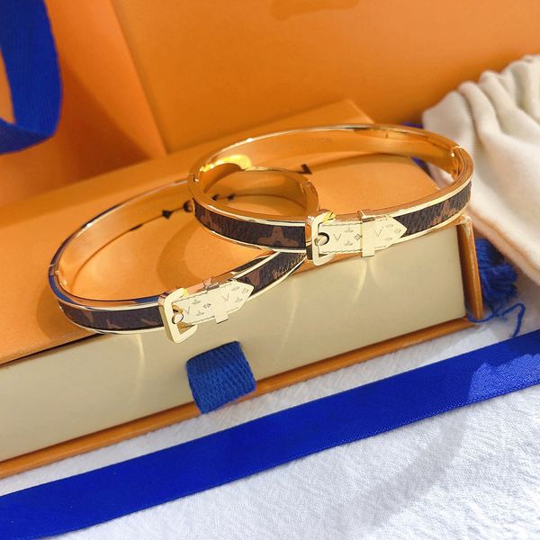 Elegant women's bangle bracelet featuring designer letter charms, crafted from faux leather with 18K gold-plated stainless steel, perfect as a wedding gift or stylish accessory