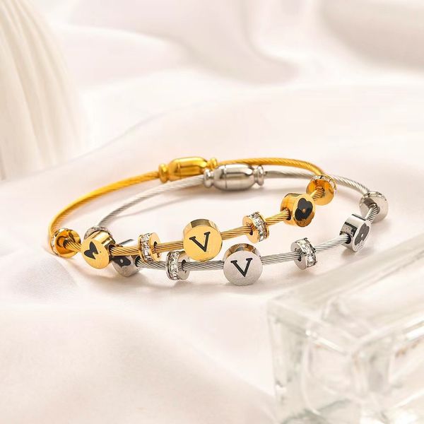 Elegant women's bracelets featuring Louise-inspired designs, crafted with 18K gold-plated stainless steel and adorned with luxurious crystals for a sophisticated look