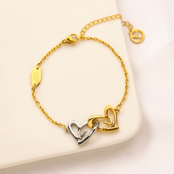 Elegant women's designer bracelet featuring a stylish 18K gold and silver plated love link chain, crafted from stainless steel for a fashionable cuff gift