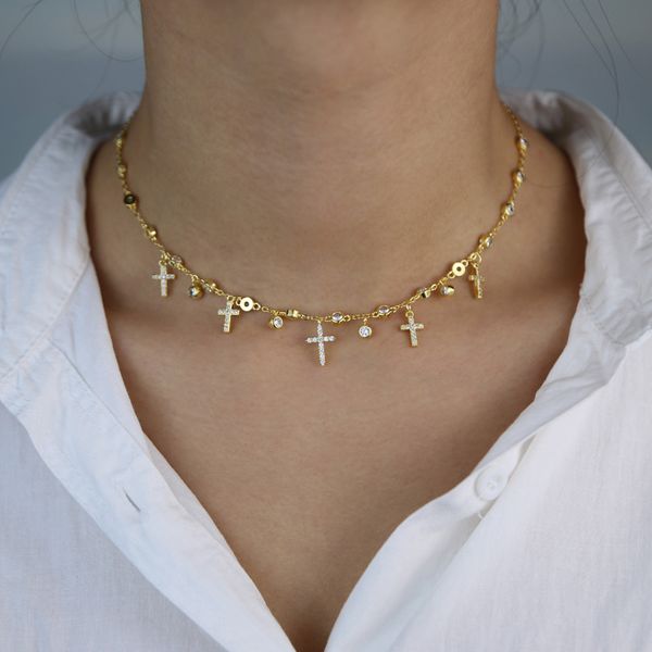 Elegant women's necklace featuring 5A cubic zirconia and a stylish cross charm on a chain choker