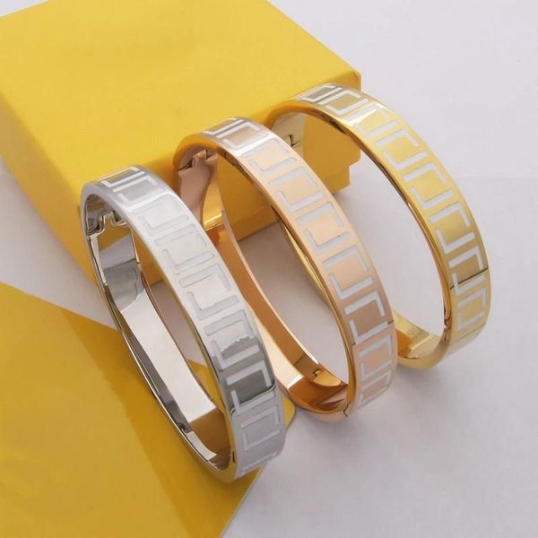 Europe America's top designer jewelry for women: elegant 18K gold bangle bracelets with engraved letters and black/white enamel in 4 color options