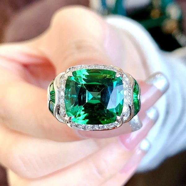 Exquisite cocktail wedding bands in 925 sterling silver with emerald pave CZ diamonds, perfect for women's engagement parties and adjustable promise rings