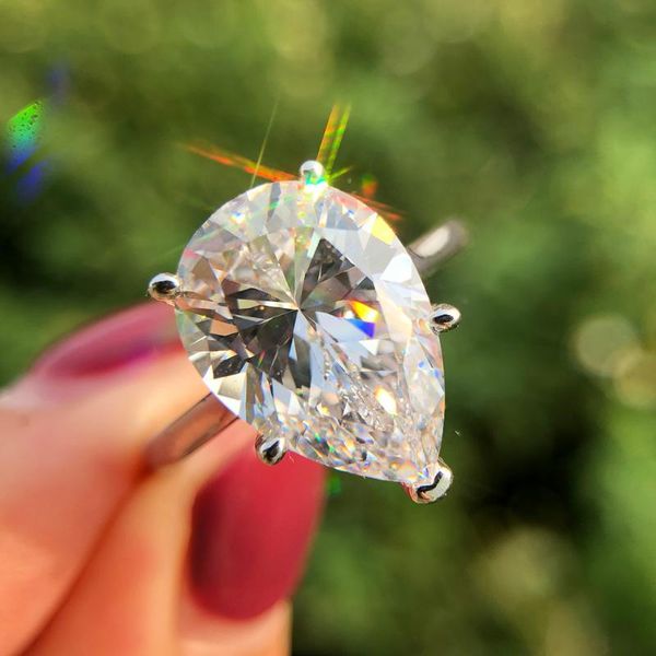 Fashion 925 sterling silver pear-shaped moissanite engagement rings for women, featuring a cluster design in fine wholesale jewelry