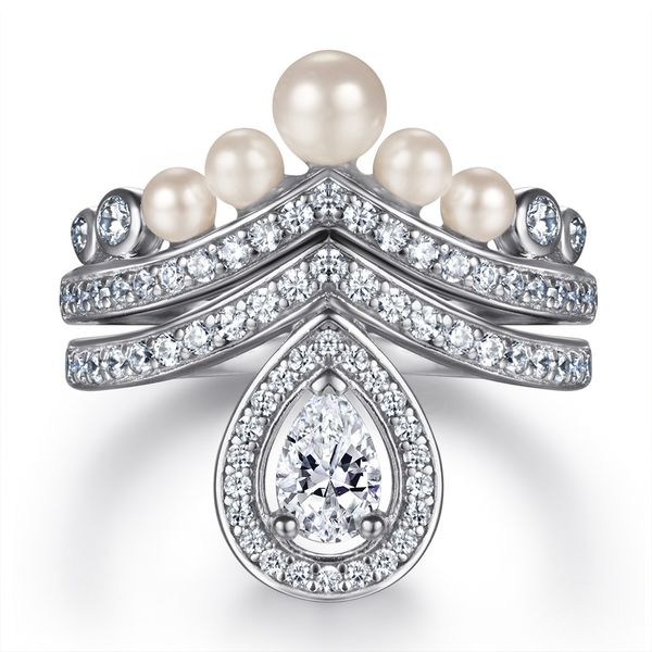 Fashion Designer Ring featuring a 0.5CT pear-cut brilliant diamond with white topaz gemstones and Joseph* Aigrete 925 silver simulated diamond pave for weddings and engagements
