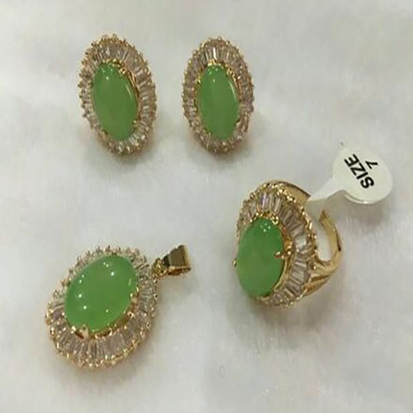 Fashion jewelry set featuring 10x14mm green jade necklace, earrings, ring (sizes 7-9), and pendant