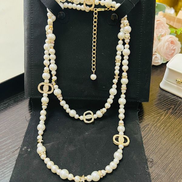 Fashionable 18K gold-plated pendant necklaces, stylish designer jewelry gifts for couples and families, featuring classic charm choker designs available for wholesale