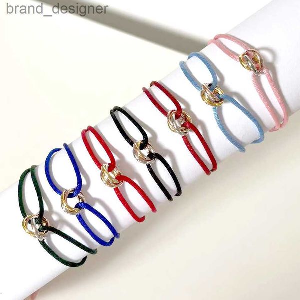 Fashionable 316L stainless steel Trinity ring bracelet with three interlocking rings, a stylish hand strap jewelry piece for both women and men