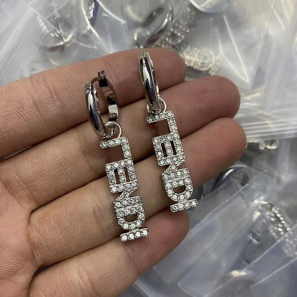 Fashionable 925 silver geometric letter earrings with crystal accents, tassel dangle design, and pearl embellishments for women's luxury wedding or party wear