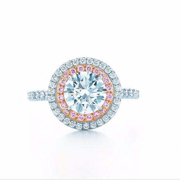 Fashionable 925 Sterling Silver ring featuring a 2ct round-cut pink Sona diamond with a surrounding pave setting of CZ stones, perfect as a women's wedding band