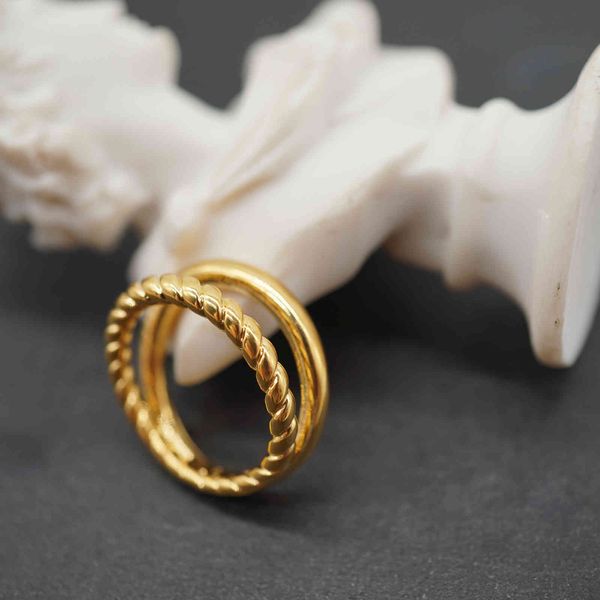 Fashionable and trendy, the simple double ring features real gold metallic ins style