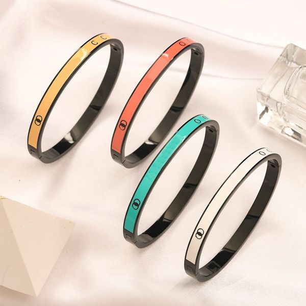 Fashionable enamel bangle bracelets for women and men, featuring black-plated stainless steel in a luxury designer jewelry style, perfect as a lovers' gift