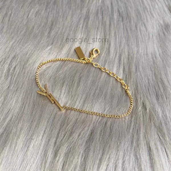 Fashionable gold charm bracelets for women, perfect for parties, weddings, and engagements, presented in an elegant box