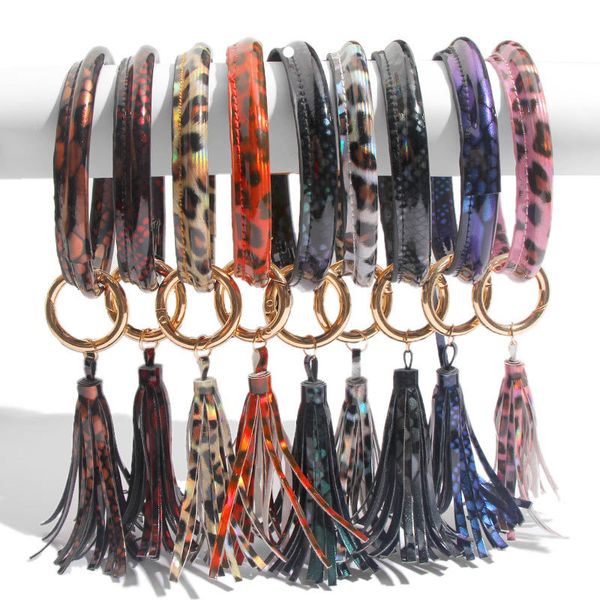 Fashionable leather bracelets with snake, leopard, and tassel charms for keys, bags, and jewelry
