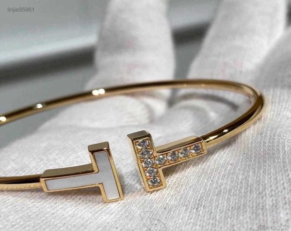 Fashionable light luxury bangle with dual sterling silver and rose gold enamel links, model a21948361