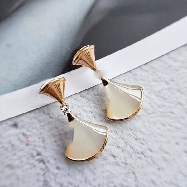 Fashionable luxury dangle earrings with diamond-studded fan designs for elegant women