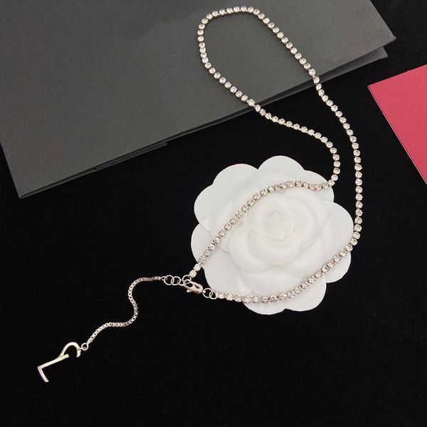Fashionable pendant necklaces featuring designer letter designs in four stylish options for a personalized touch