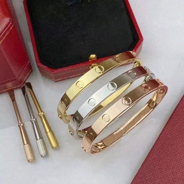 Fashionable screw bracelet in 18K silver-plated titanium steel with diamond accents, a trendy bangle for both women and men