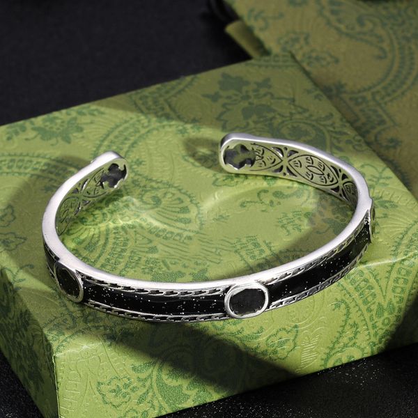 Fashionable silver bangle bracelet for women, a luxurious designer jewelry piece
