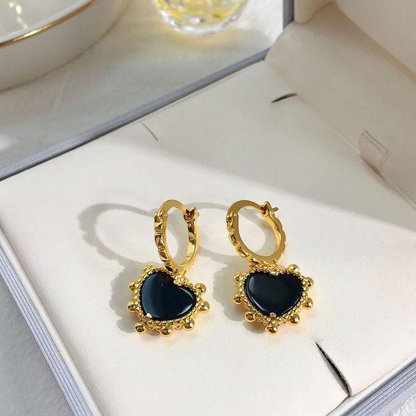 Fashionable stainless steel heart stud earrings with pearl accents and smooth irregular enamel designs for women