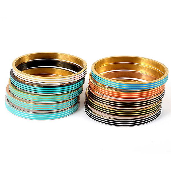 Fashionable striped enamel bracelet and bangle set for women, featuring a gold boho design in stainless steel, perfect as a jewelry accessory or gift
