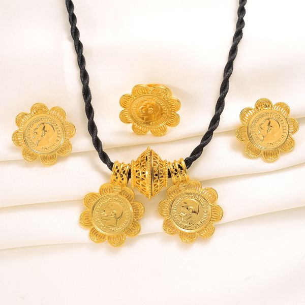 Fine 14k gold women's jewelry set featuring large coin pendant necklace and earrings, perfect for Dubai brides and African weddings