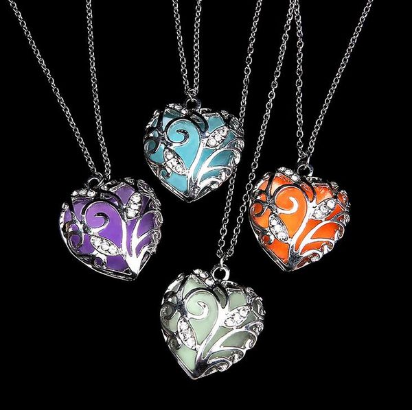 Free shipping 2017 new hollow luminous heart-shaped necklace luminous pendant female WFN149 (with chain) mix order 20 pieces a lot  

Rewritten:  
Free shipping 2017 new hollow glowing heart pendant necklace for women WFN149 (includes chain) mixed order 20 pieces per lot