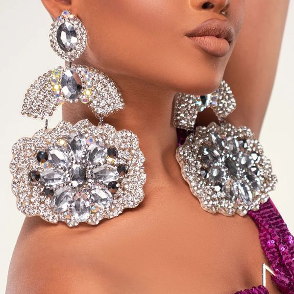 Geometric floral-inspired bold earrings for women, featuring oversized crystal drops perfect for prom or bridal jewelry