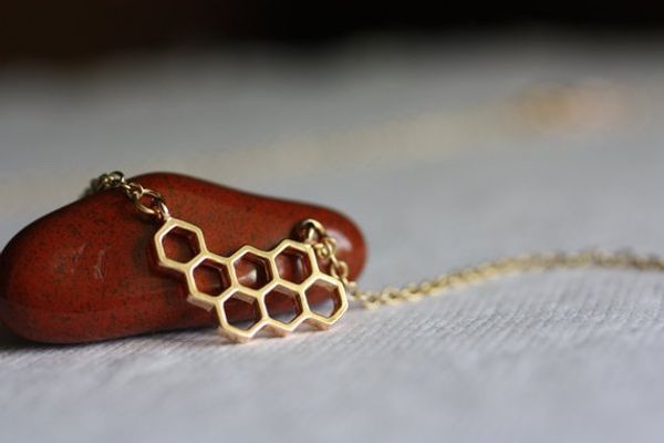 Geometric honeycomb bee hive necklace with cute hexagon design, a stylish jewelry accessory and gift