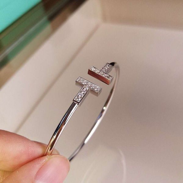 gold moissanite bangle bracelet for women, custom designer jewelry with a creative screw design, high-quality piece