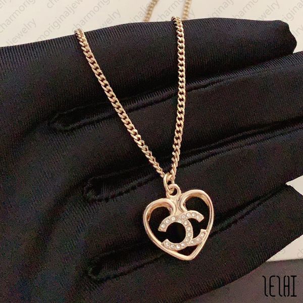 Gold pendant necklaces for women featuring diamond accents and luxurious link chain designs