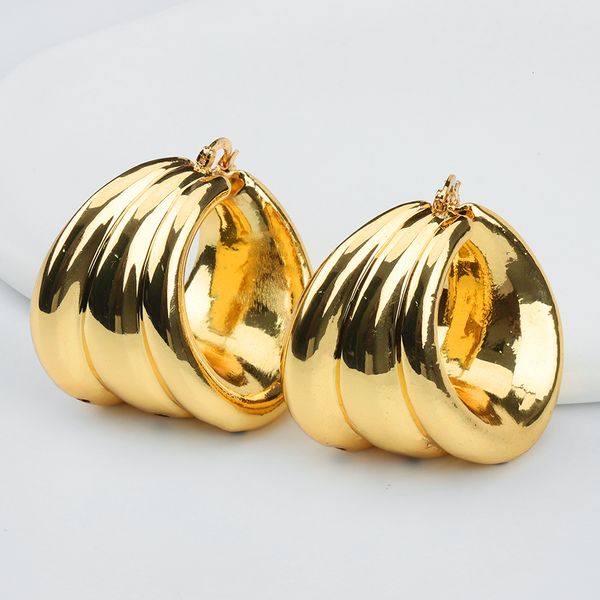 Gold-colored African hoop earrings for women, elegant dangle jewelry perfect for Dubai weddings and bridal accessories