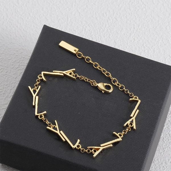 Golden silver bracelet for women with letter charms, elegant wedding jewelry featuring chain links and cuff design, a stylish bangle gift