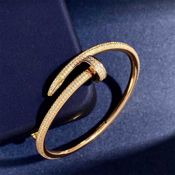 Gold-plated heart-shaped bangle with crystal CZ stones for women, symbolizing eternal love