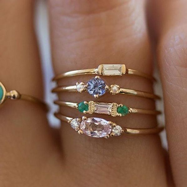 Gold-tone cubic zirconia cluster ring set for women, 4-piece midi finger jewelry, stylish party gift KAR194