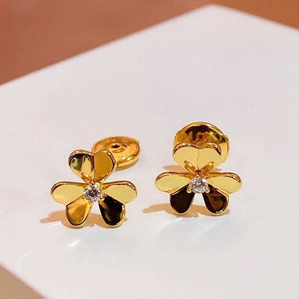 Gold-tone floral earrings in 925 sterling silver, featuring a lucky clover design for weddings and parties, petite and charming