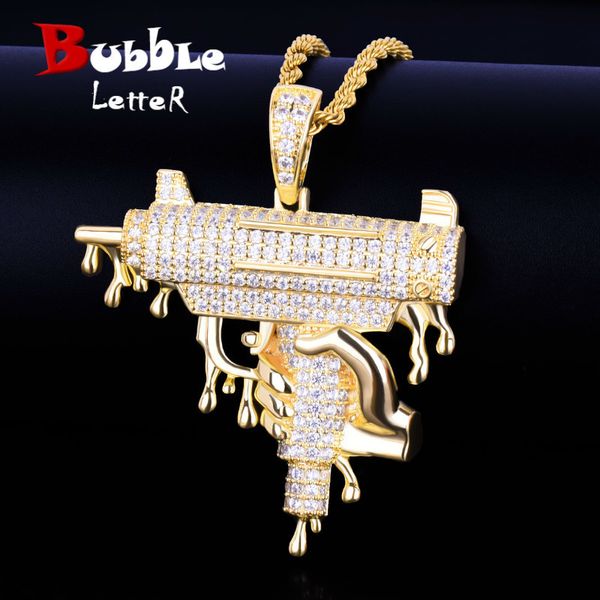 Gold-tone men's hip hop pendant necklace featuring a gun-shaped design with dripping effect, adorned with cubic zirconia stones, measuring 5x5.7cm