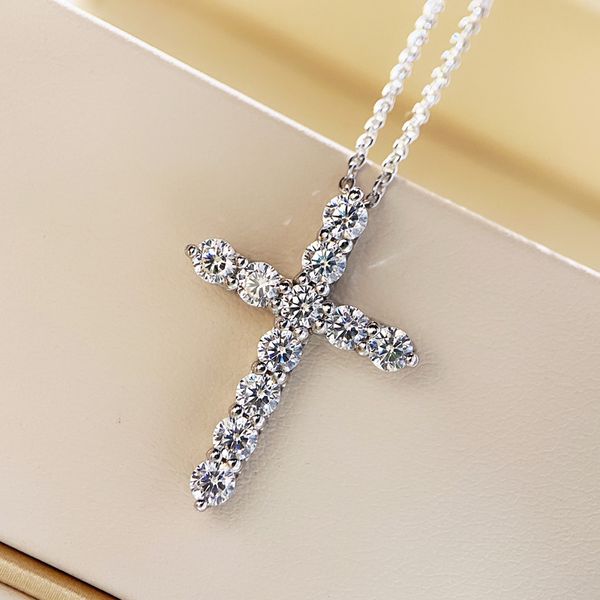 Handcrafted 925 sterling silver cross pendant with cubic zirconia diamonds, perfect for women's bridal and wedding jewelry