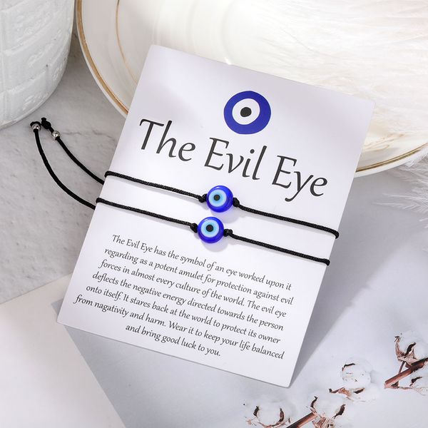 Handcrafted blue evil eye bracelets set with red and black string, a protective luck charm for women, men, family, and friends