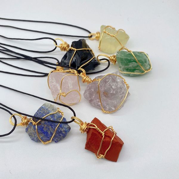 Handcrafted gold-plated necklace featuring seven unique natural crystal stone pendants for stylish women's fashion