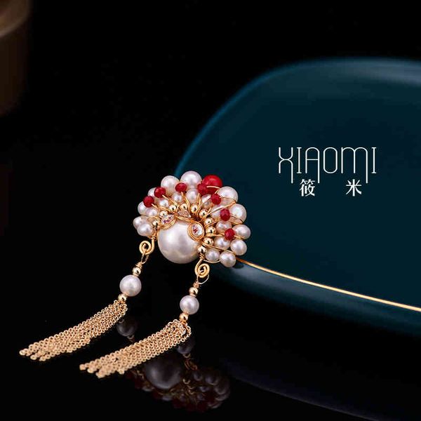 Handcrafted pearl brooch featuring a Peking Opera mask design for women