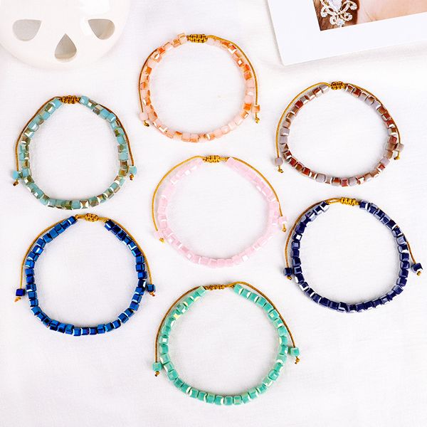 Handcrafted square glass bead bracelet with woven design